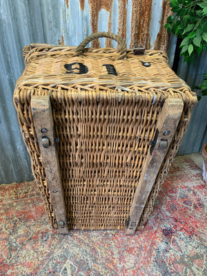 A Victorian wicker laundry basket on castors ~ B