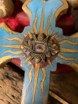 A set of oversized wooden rosary beads with eye motif