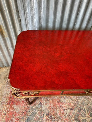 A red lacquer continental table