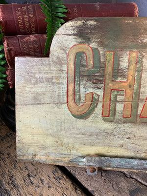 A French ‘charcuterie’ sign with hanging rack