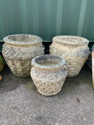 A TRIO of cast stone Cotswold Studios planters for Rebecca