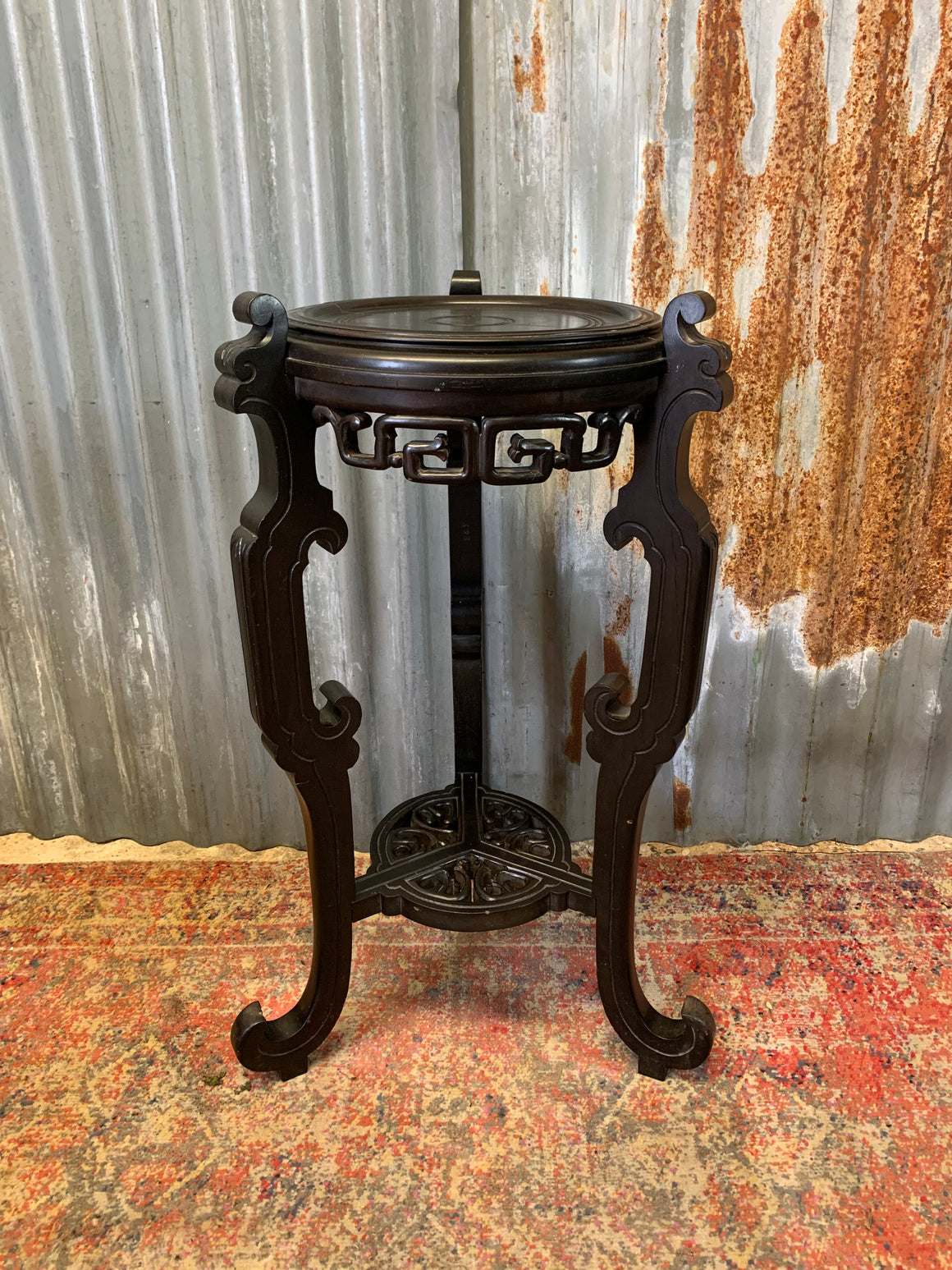 A Chinese black ebonised jardinière pedestal stand
