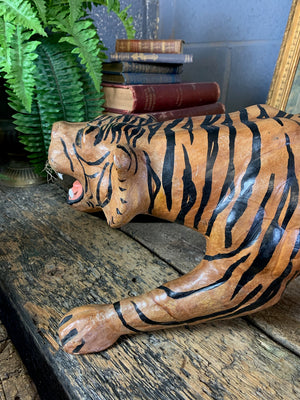 A large brown leather tiger