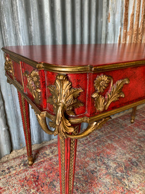 A red lacquer continental table