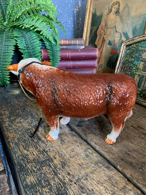 A large ceramic Hereford bull by Nelson Pottery