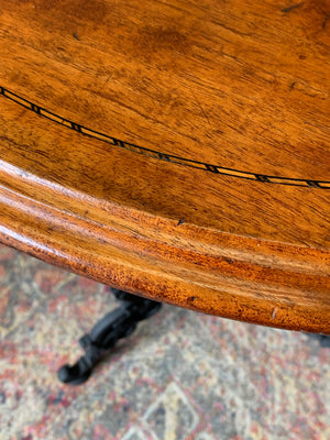 A black cast iron pub table