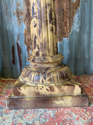 A pair a faux marble wooden stands