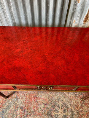 A red lacquer continental table