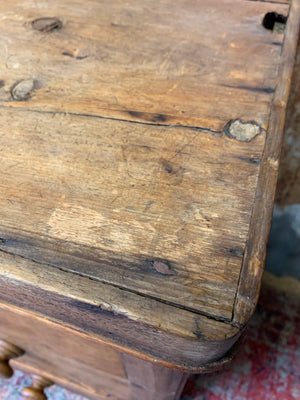 A pine chest of two over two drawers