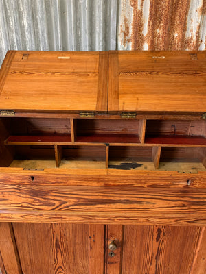 A pine double lectern standing desk
