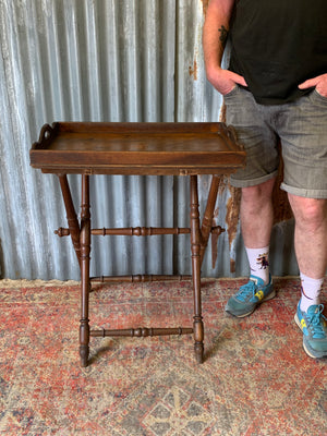 An oak butler's tray table