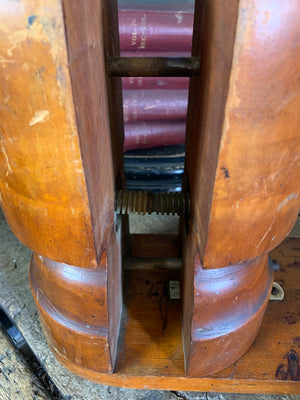 A wooden millinery hat stretcher