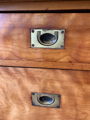 A satinwood chest of drawers