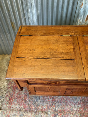 A pine double lectern standing desk