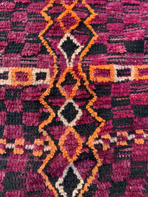 A very large purple ground Berber rug ~ 415cm or 14ft