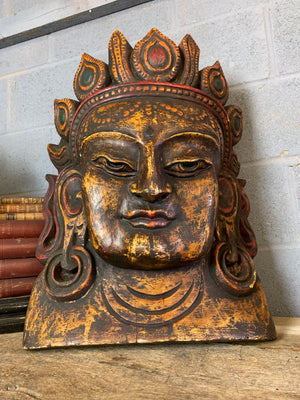 A very large hand-carved bodhisattva head