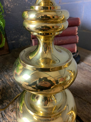 A pair of baluster form brass lamps