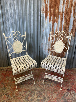 A lattice design garden table and chairs set