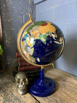 A lapis blue terrestrial gemstone globe