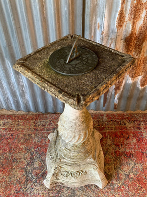 A large cast stone sundial