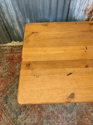 A large pine coffee table