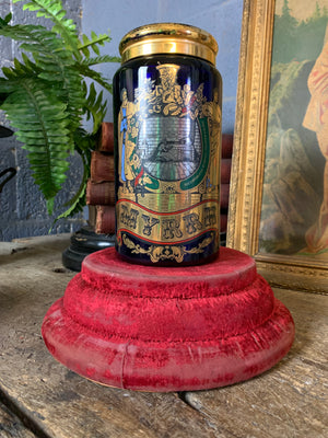 A blue glass myrrh apothecary jar by the Royal Pharmaceutical Society