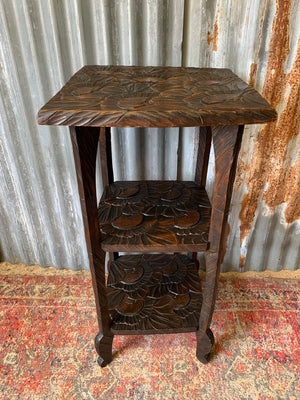 A Japanese carved three tier side table for Liberty London