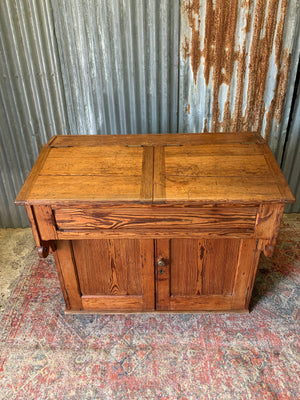 A pine double lectern standing desk
