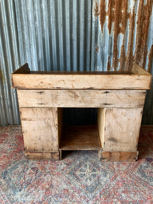 A pine clerk's desk with galleried top