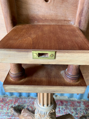 A Georgian style tilt top table with ball and claw feet