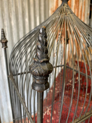 A large black Gothic bird cage