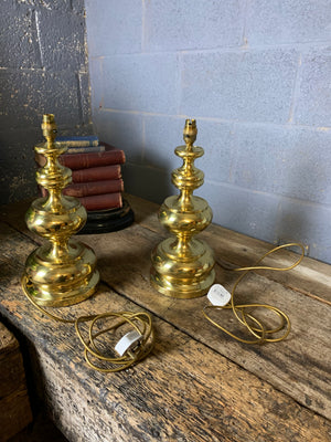 A pair of baluster form brass lamps