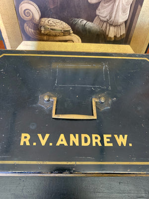 A Victorian black metal strong box with lock and key