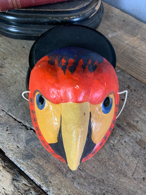 A Ukrainian papier-mâché mask of a macaw