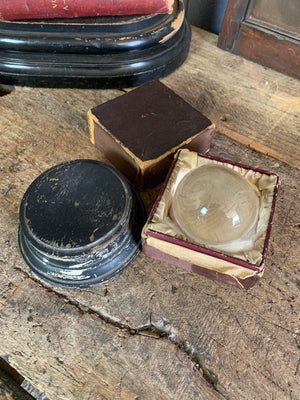 A Victorian crystal ball with box and stand