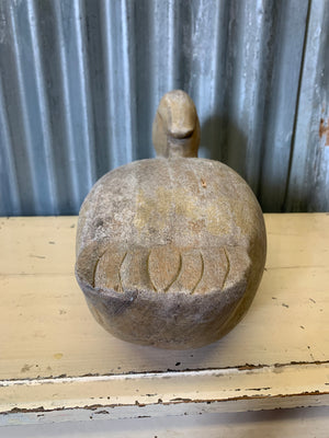 A wooden duck decoy
