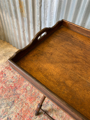 An oak butler's tray table