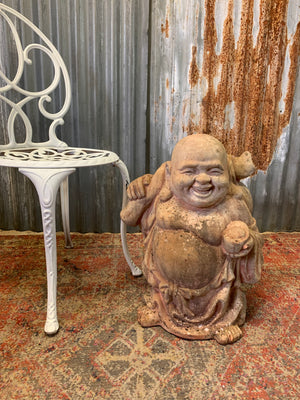 A large terracotta buddha statue