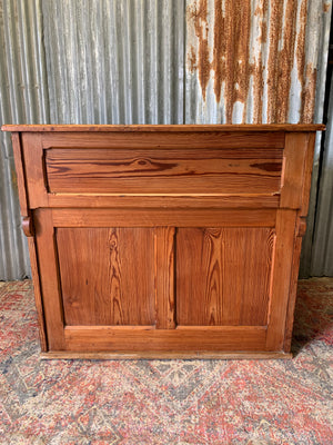 A pine double lectern standing desk