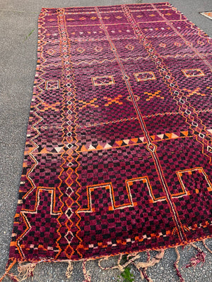 A very large purple ground Berber rug ~ 415cm or 14ft