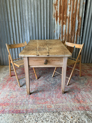 A pine kitchen table by Staines of Westminster