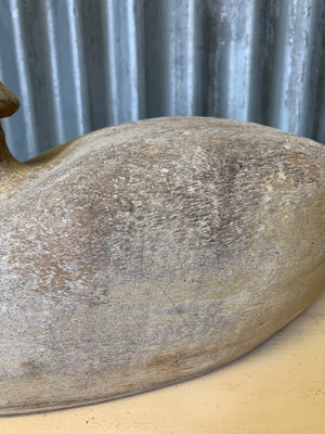 A wooden duck decoy