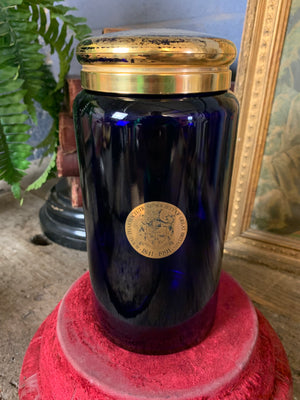 A blue glass myrrh apothecary jar by the Royal Pharmaceutical Society