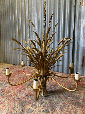 A chandelier in the form of a wheatsheaf