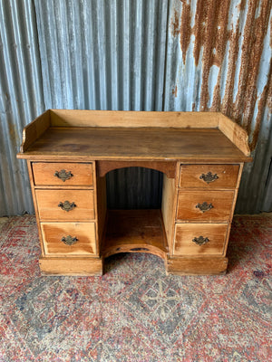A pine clerk's desk with galleried top