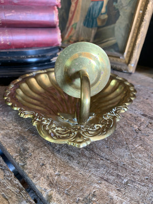 A pair of large brass shell candlestick wall sconces