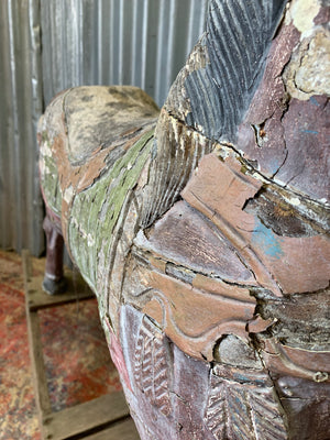 Carved wooden rocking horse