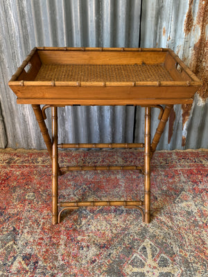 A faux bamboo butler's tray table