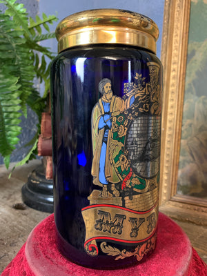 A blue glass myrrh apothecary jar by the Royal Pharmaceutical Society