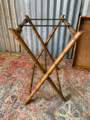 A faux bamboo butler's tray table